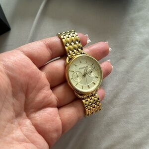 Gold fossil watch